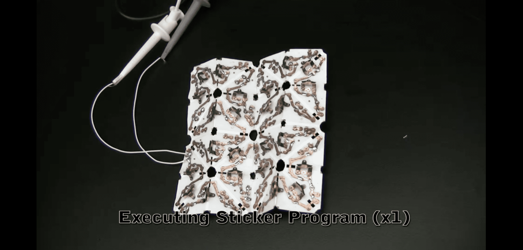 Designing and Programming Self-Folding Sheets